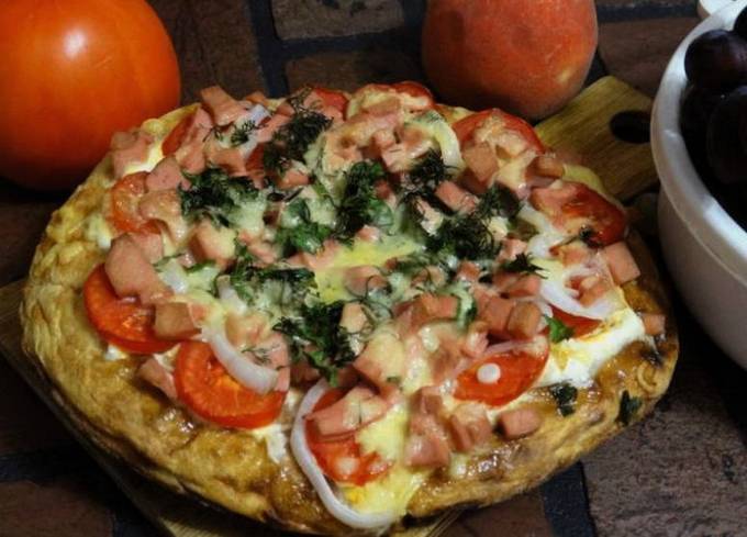 Pizza aus dickem Fladenbrot im Ofen